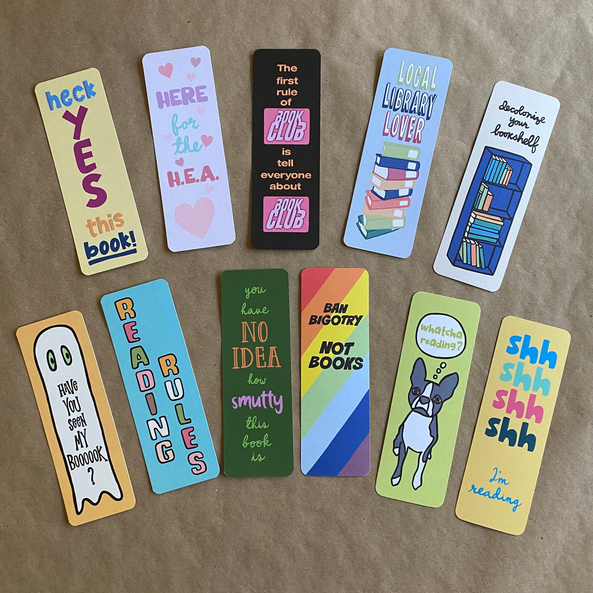 a photo of an assortment of bookmarks featuring original art and hand lettering by AnneArchy