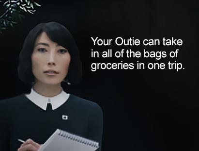 a meme featuring Ms Casey from Wellness, with the text "Your Outie can take in all of the bags of groceries in one trip"