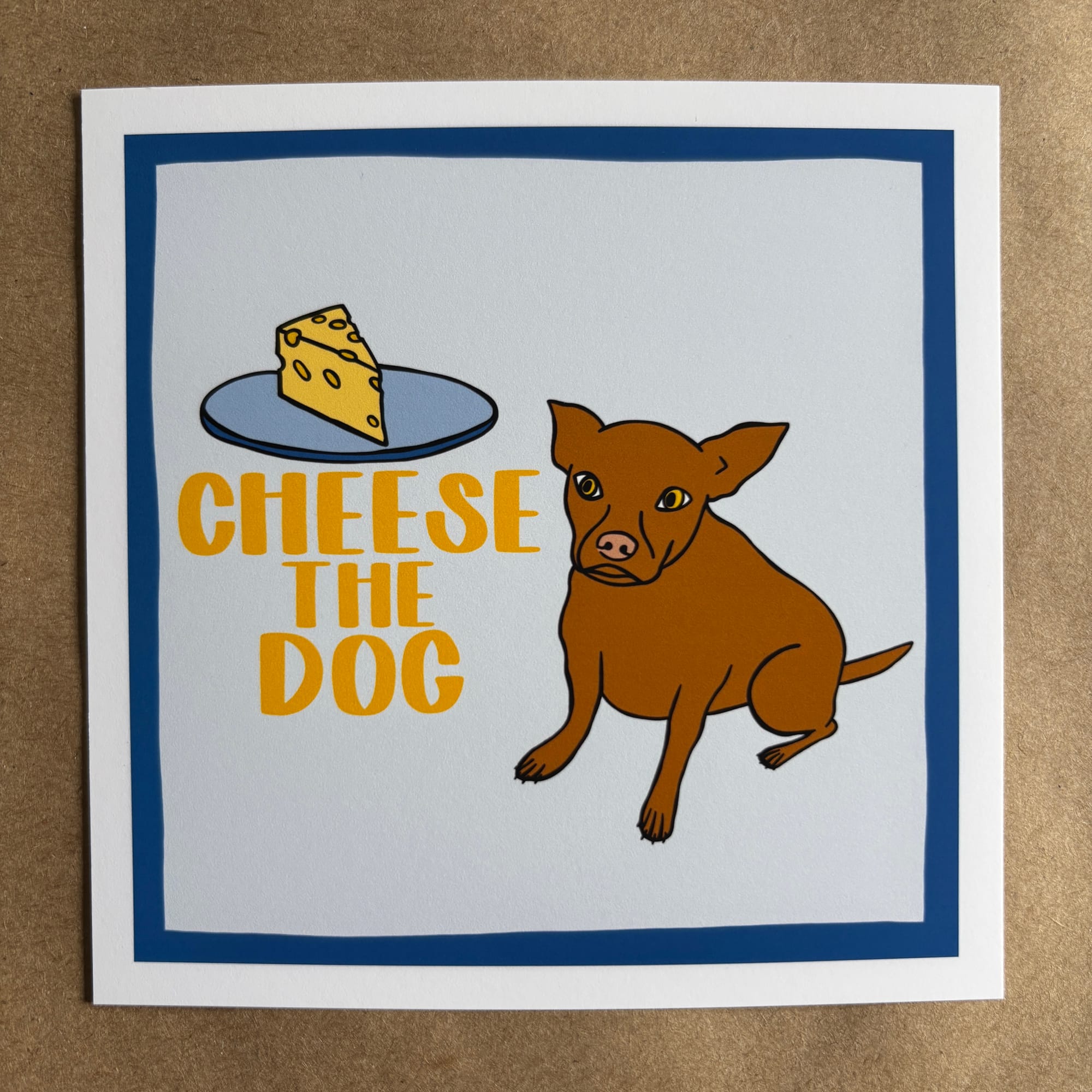original art by AnneArchy of a dog near a plate of cheese with hand lettering of the words "cheese the dog"