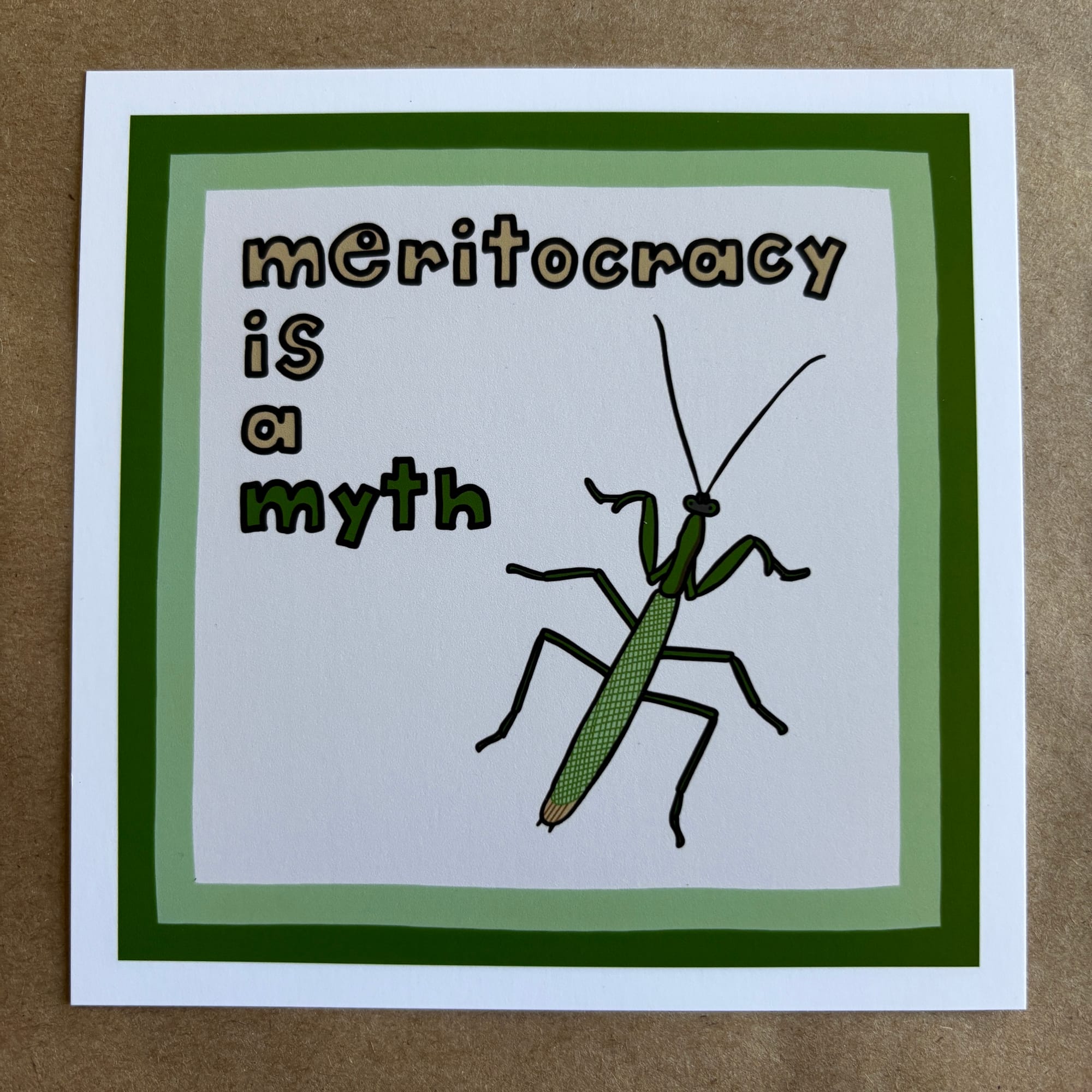 original art by AnneArchy depicting a praying mantis with hand lettering of the words "meritocracy is a myth."