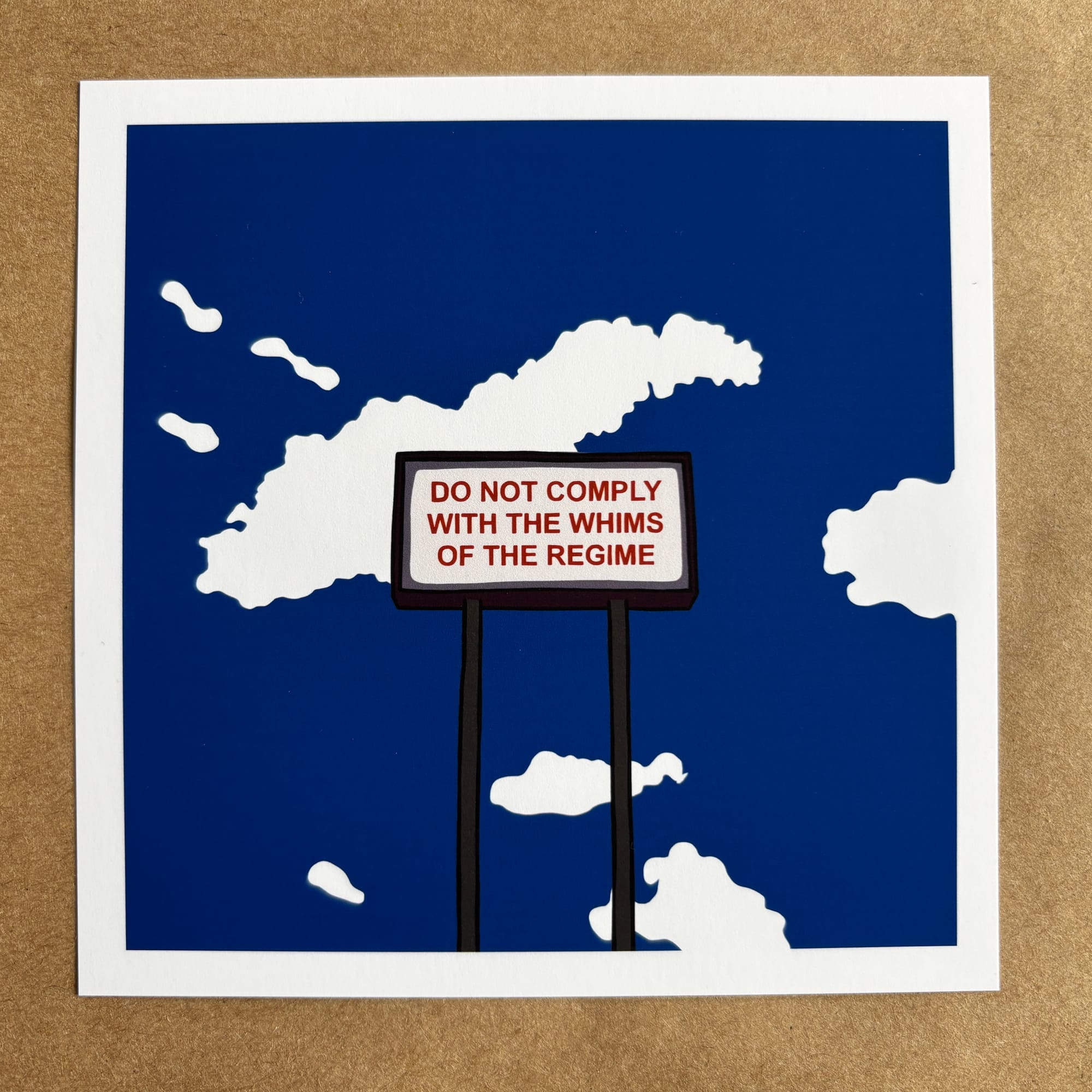 original art by AnneArchy depicting a tall sign amidst a blue sky and fluffy white clouds, with hand lettering of the words "do not comply with the whims of the regime"